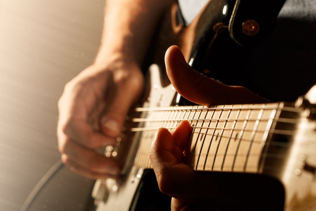 Tocar guitarra talento